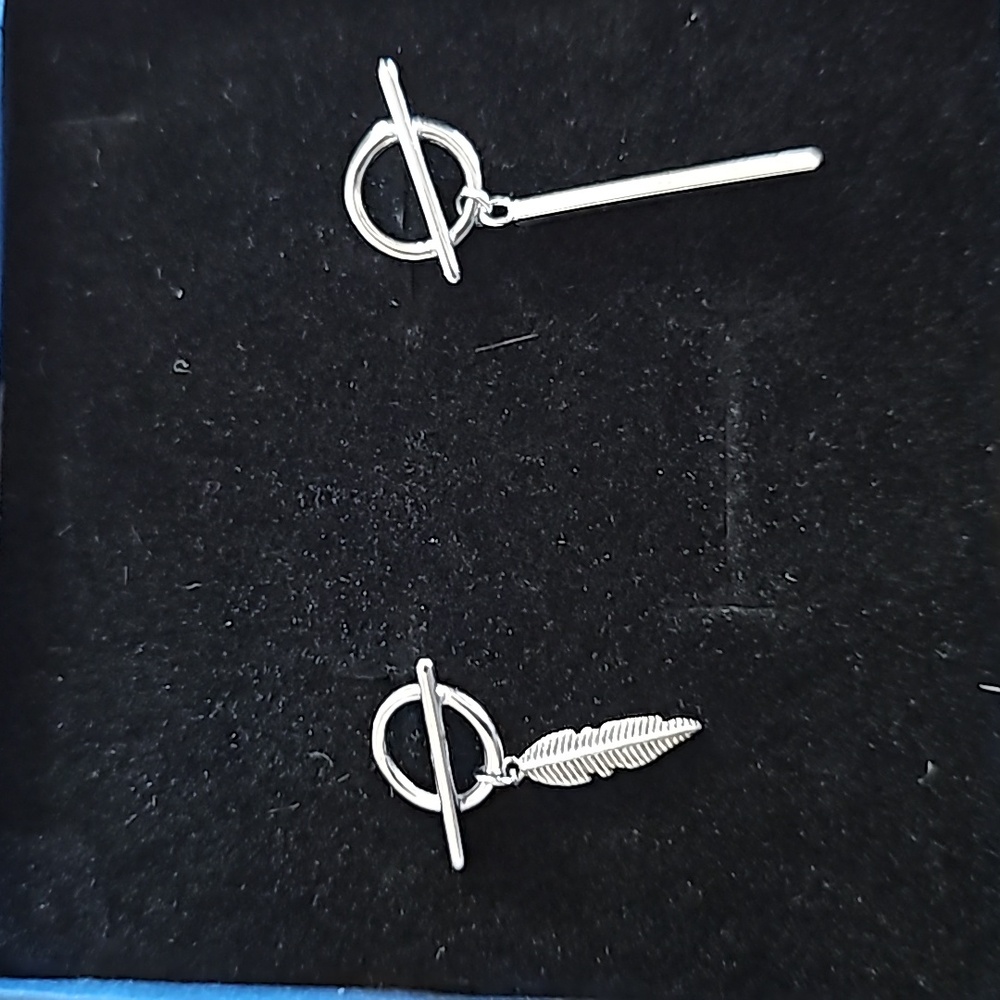 Mismatched feather silver earrings NWT